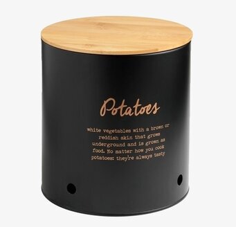 Foto av stilren potatisburk med trälock och ventilation