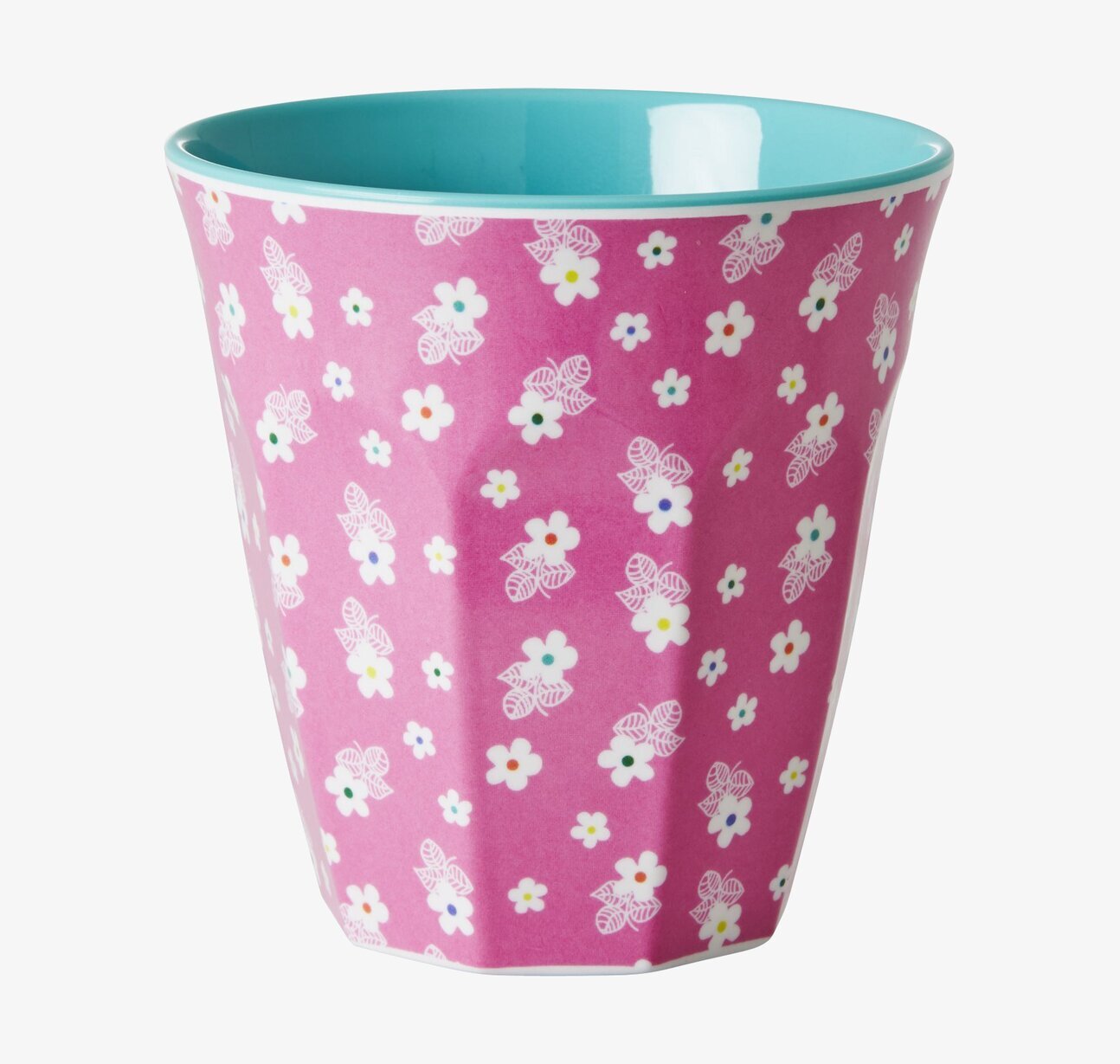 Bild av en livfull mugg med blommönster och färgkontrast