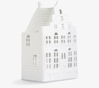 Foto av elegant ljuslykta med kanalhusdesign