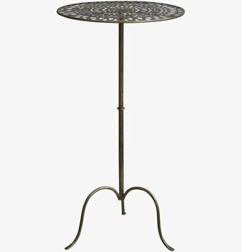 Foto av runt bord i antik mässing med mönster