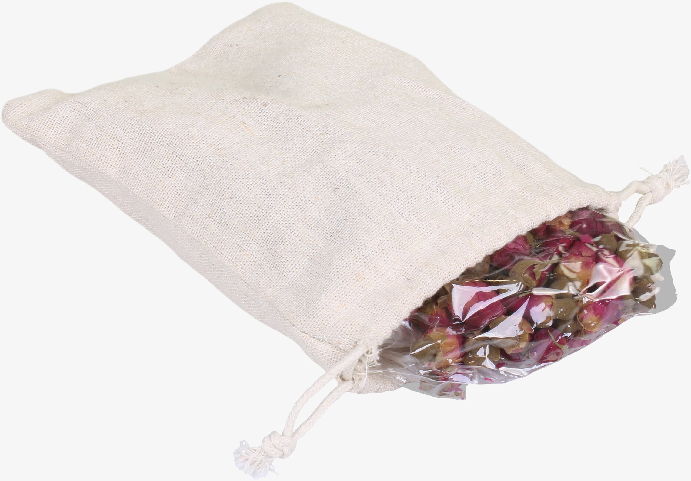 Bild av rustik påse med potpurri av torkade rosenblad