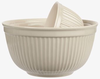 Bild av elegant och funktionellt skålset i latte-ton