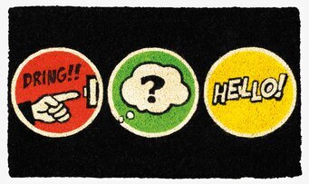 Bild av lekfull dörrmatta med cirkulära sektioner
