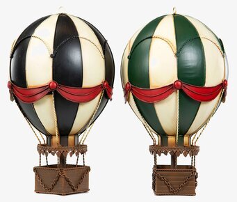 Foto av två metalliska luftballonger i dekoration