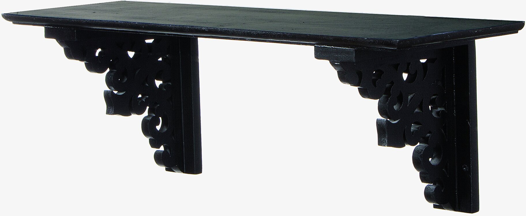 Bild av svart hyllplan med snidade konsoller