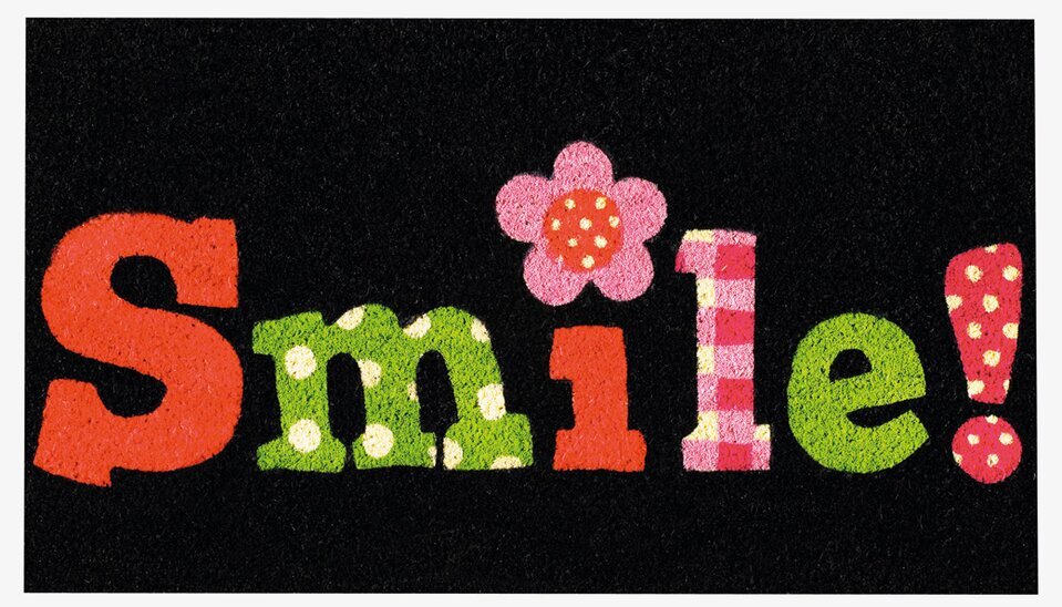 Foto av färgglad dörrmatta med lekfull design