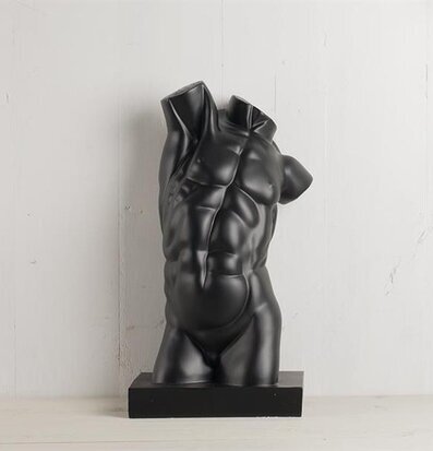 Bild av konstnärlig skulptur med djärv svart finish