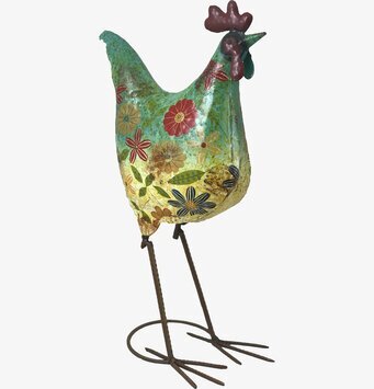 Bild av färgstark och blommig metalltupp i inredning