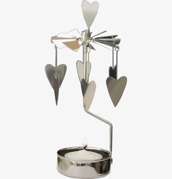 Bild av ett elegant änglaspel med hjärtan i metall