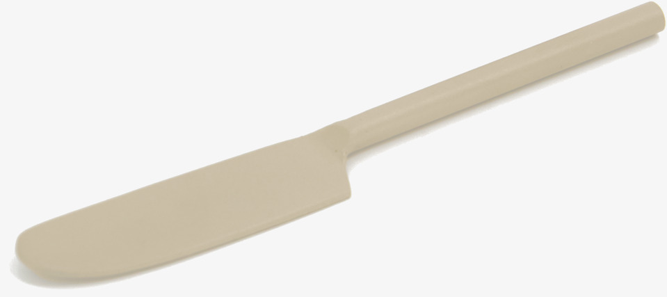 Smörkniv Metall Beige från Ernst på en ljus, neutral bakgrund