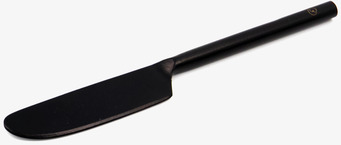 Bild av stilren smörkniv i svart metall, modern design