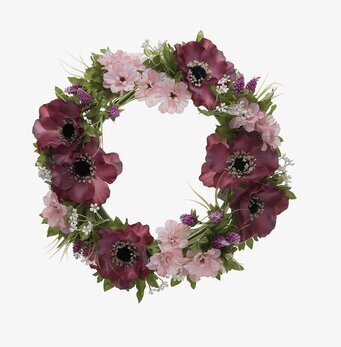 Bild av konstgjord blomsterkrans i rosa och ljung