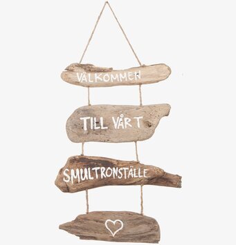 Bild av rustik skylt i drivved med välkomnande text