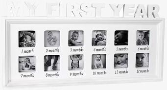 Bild: Elegant fotoram för att minnas barnets första år