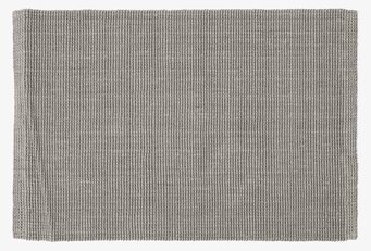 Foto av stilren och hållbar dörrmatta i grå jute