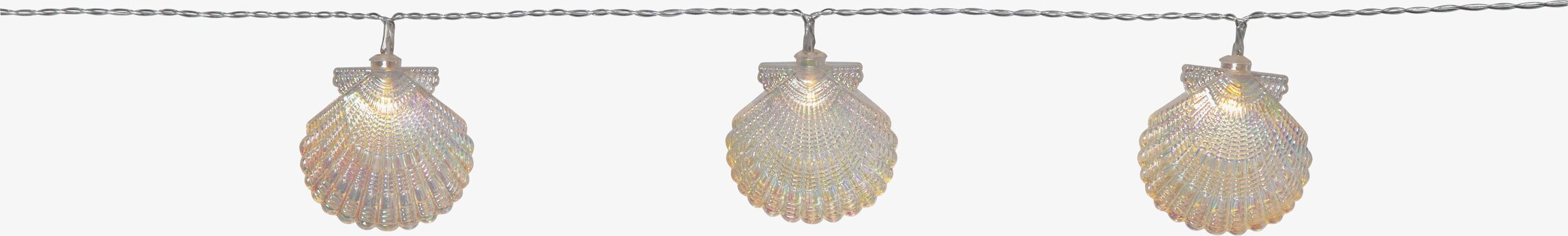Bild av detaljrik ljusslinga med skimrande snäckor