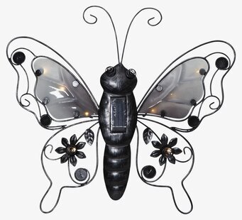 Foto av solcellsdriven fjärilsdekoration i trädgård