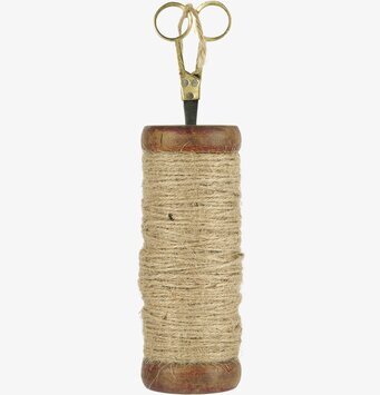 Foto av rustik trådhållare med sax och jutesnöre