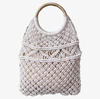 Bild av elegant och funktionell väska med rottinghandtag