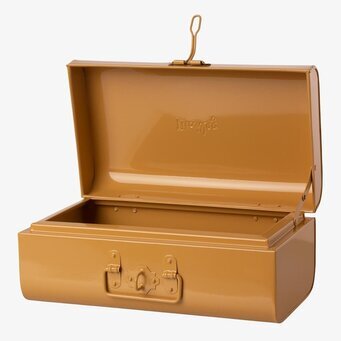 Bild av stilfull ockrafärgad koffert för förvaring