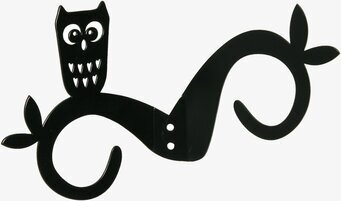 Bild av svart ugglehängare med stilren och lekfull design