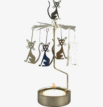 Bild av dekorativt änglaspel med kattmotiv i metall