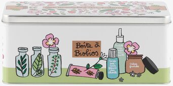 Bild av stilfull plåtburk med botaniska illustrationer