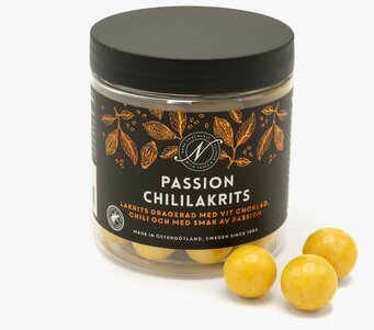 Bild av elegant lakrits i gyllene chokladöverdrag