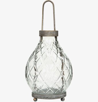 Bild av dekorativ glaslykta med metalliska detaljer