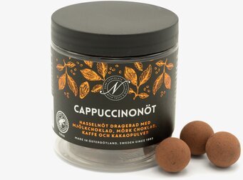 Bild på stilren förpackning med lyxiga chokladnötter