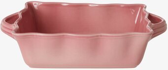 Bild av rosa ugnsform med vågiga kanter och handtag