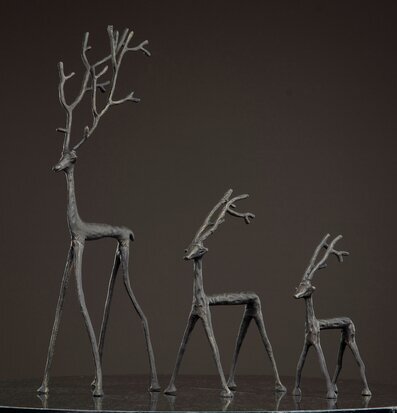 Bild av tre stiliserade renar i gjutjärn skulpturer