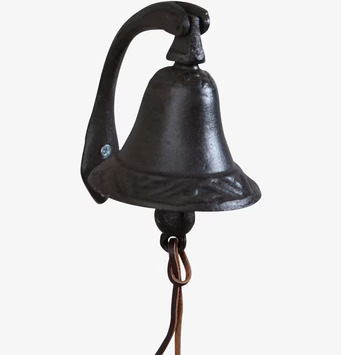 Foto av elegant svart gjutjärnsklocka i klassisk stil