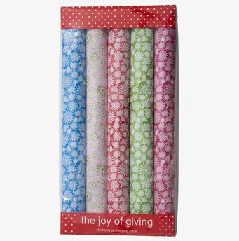 Bild av färgglatt presentpapper med blommiga mönster