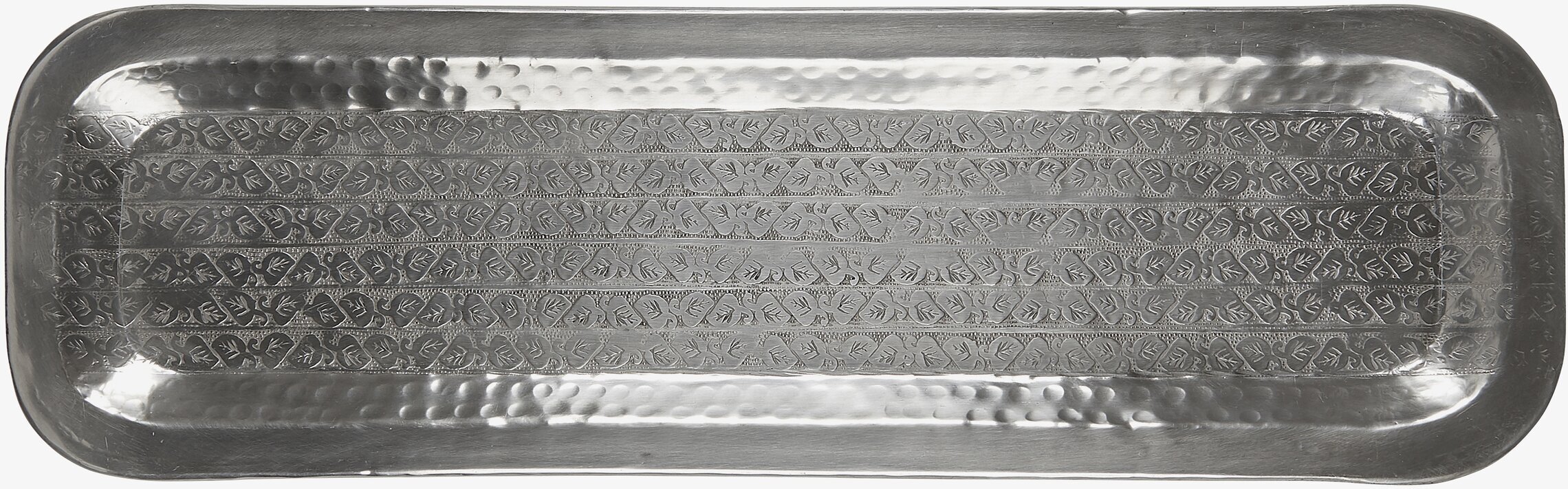 Bild av en elegant antik silverbricka med mönster