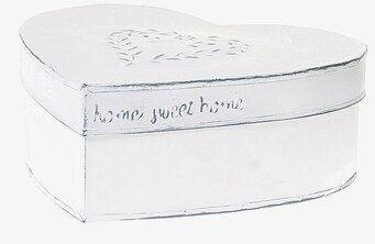 Bild av hjärtformad kakburk i vit ton med dekorativ design