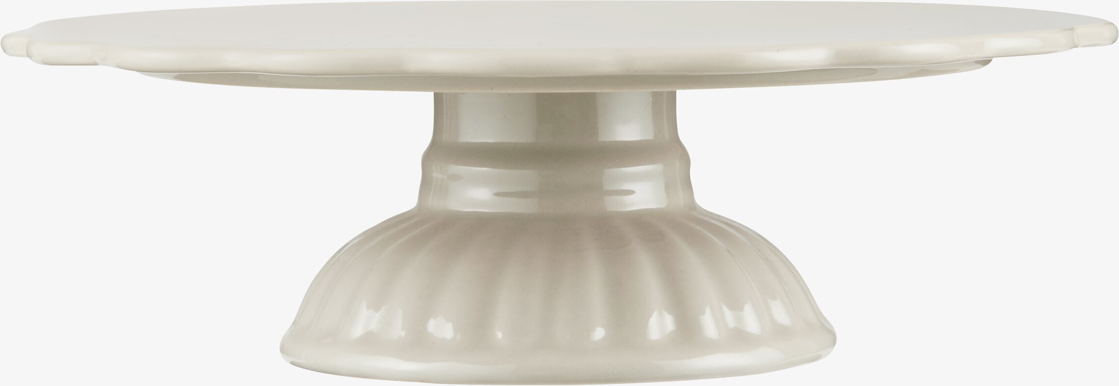 Bild av elegant och funktionellt tårtfat i lattefärg