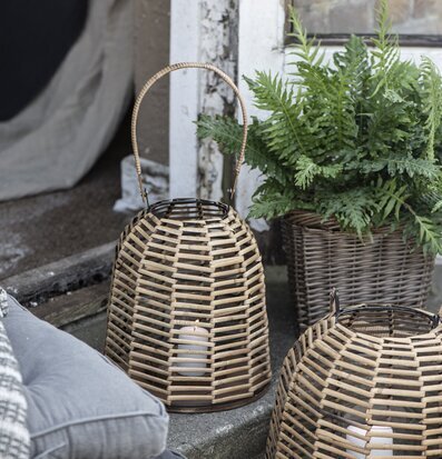 Bild av charmigt utomhusarrangemang med rottingdetaljer