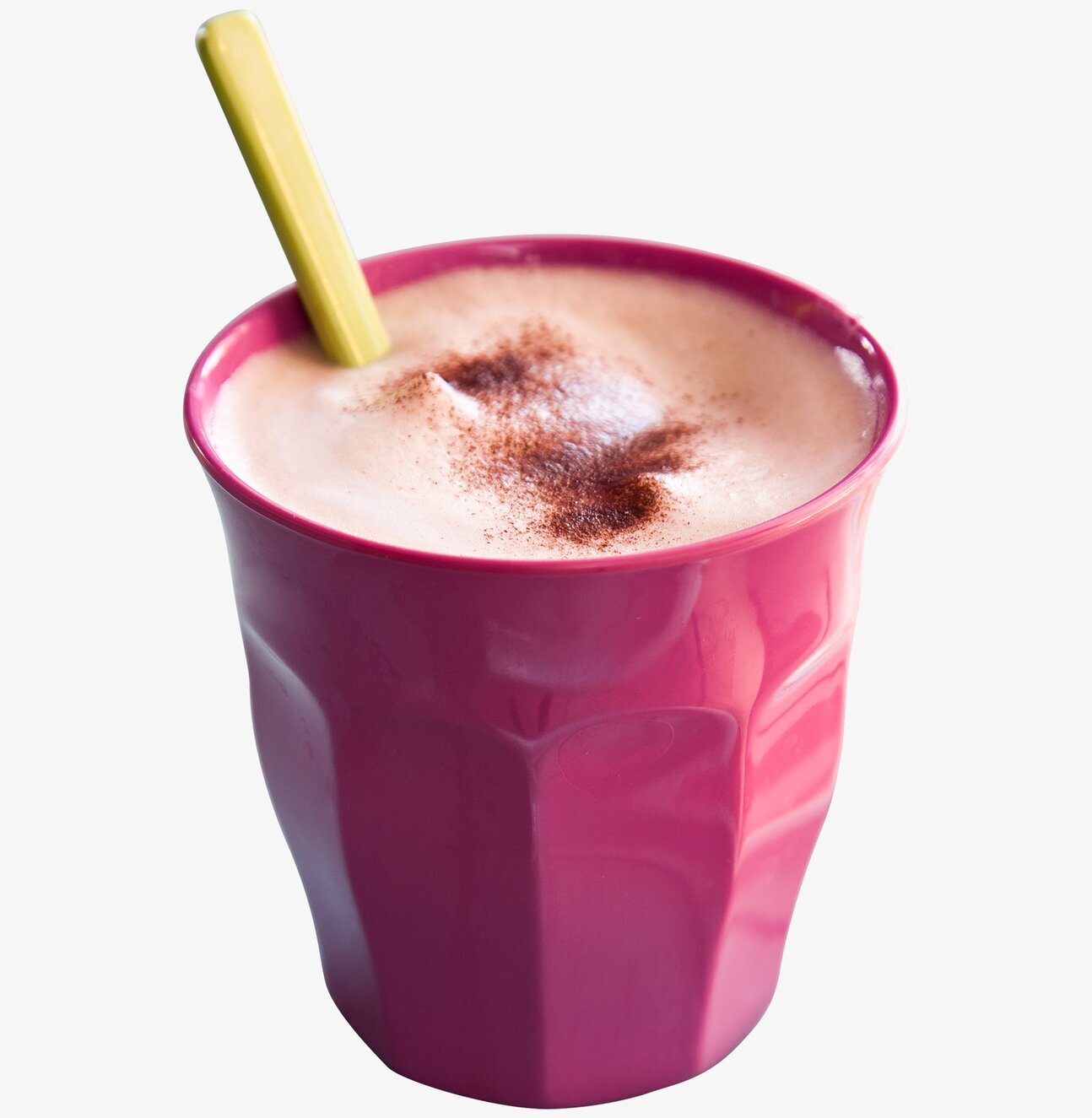 Mugg Hallon från Rice med skummig dryck och grön sked