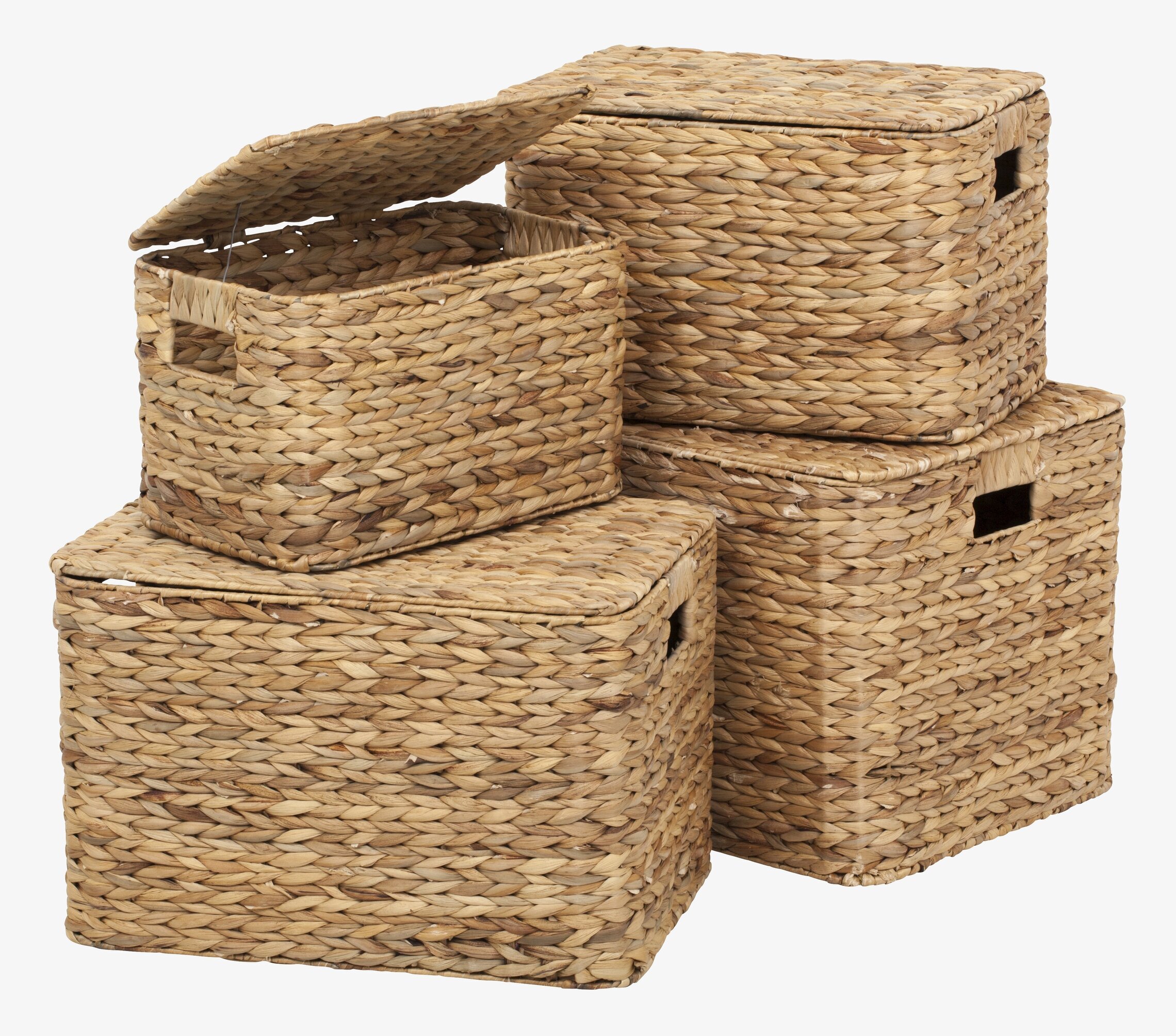Bild av fyra flätade förvaringskorgar med lock