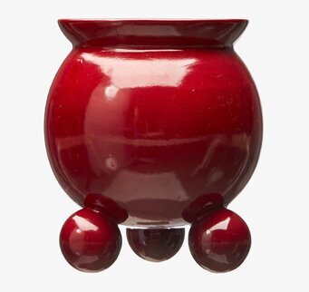 Bild av handgjord kruka med unik design och färg