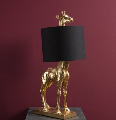 Bild av elegant lampa med giraffdesign i guld och svart