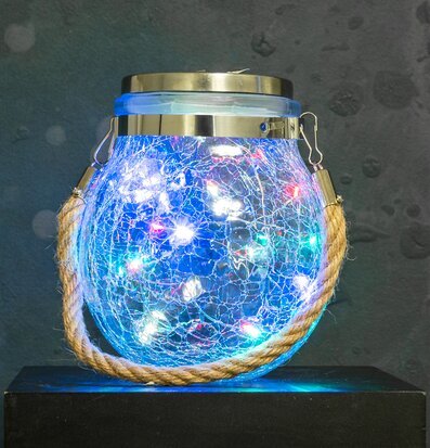 Foto av LED-solcellslampa med krackelerat glas