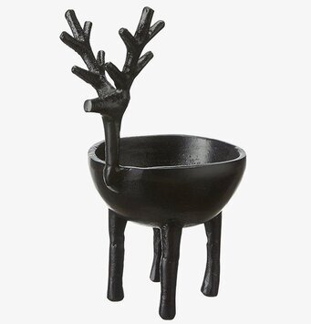 Bild av stilren svart skål med djurinspirerad design