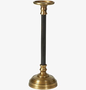 Bild av elegant ljusstake i guld och svart design
