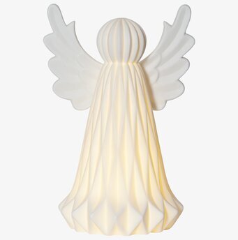 Bild av stilren ängel som bordsdekoration för vintern