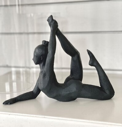 Foto av skulptur som symboliserar balans och styrka