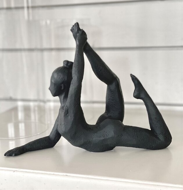 Foto av skulptur som symboliserar balans och styrka