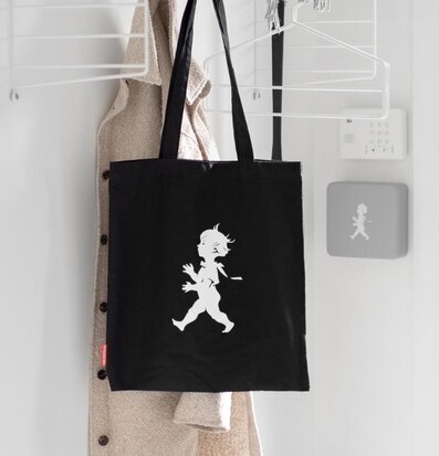 Bild av stilren svart tygkasse med ikonisk design