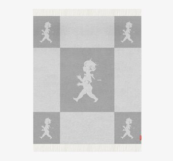 Foto av ljusgrå pläd med nostalgiskt rutmönster